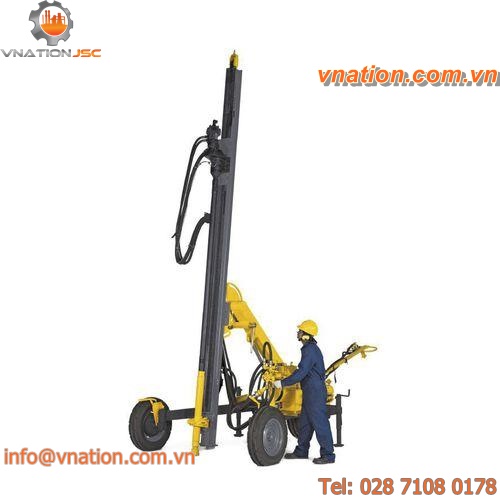 wheel-mounted drilling rig / pneumatic / down-the-hole / multi-function
